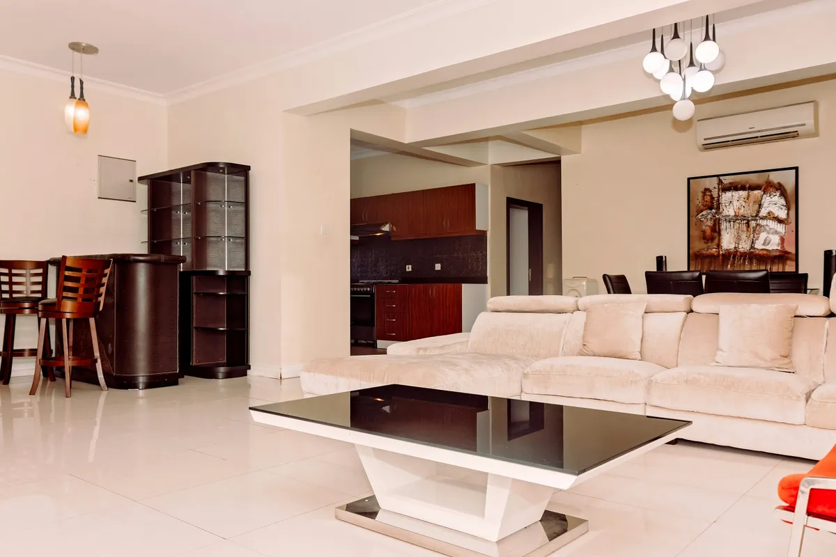 A modern, fully furnished living room in a Tanzanian home